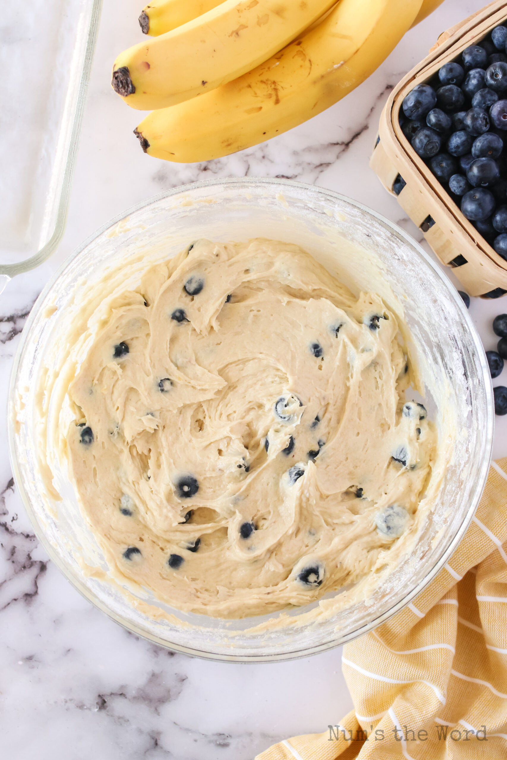 blueberries mixed into banana bread