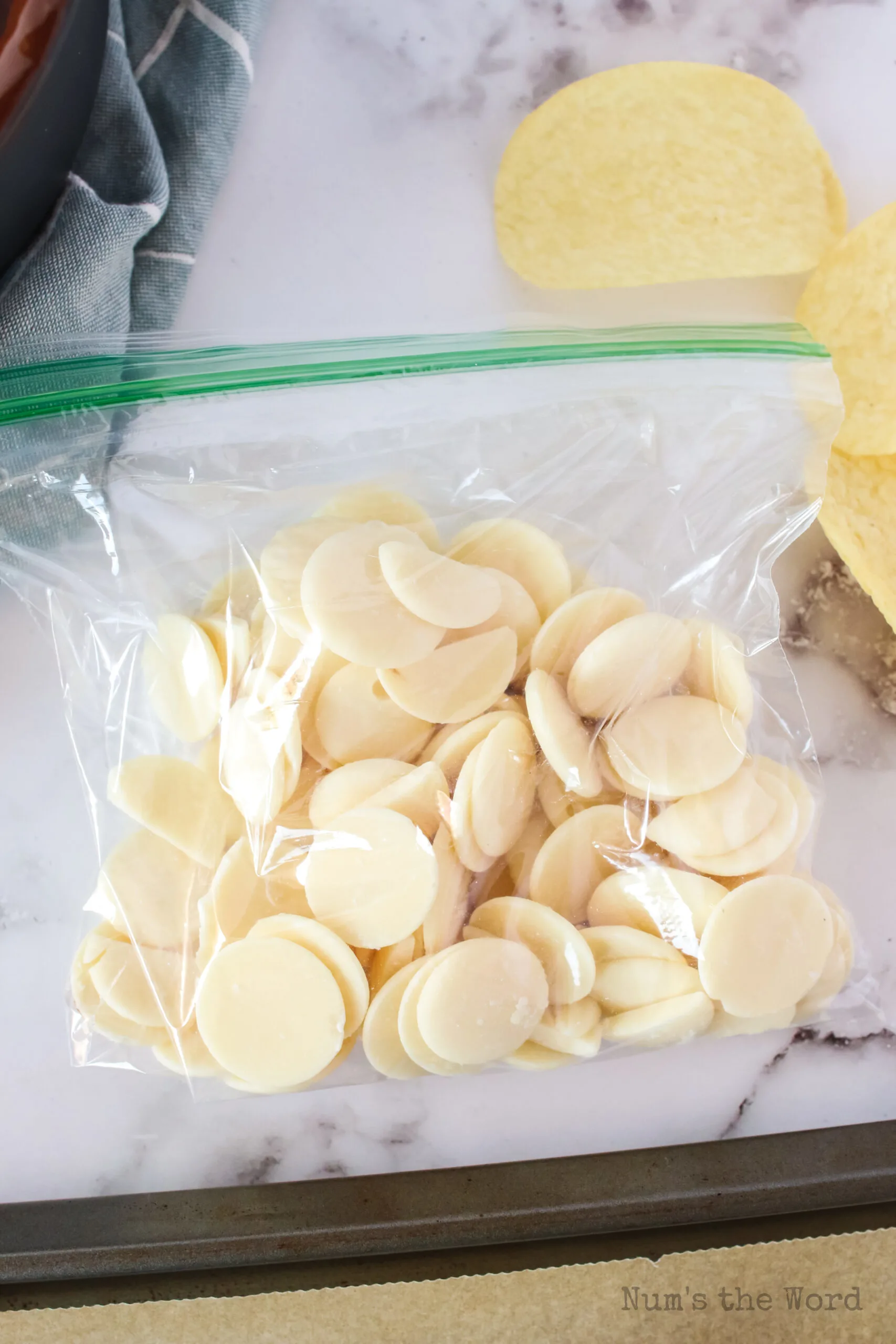 white chocolate wafers in a bag, unmelted