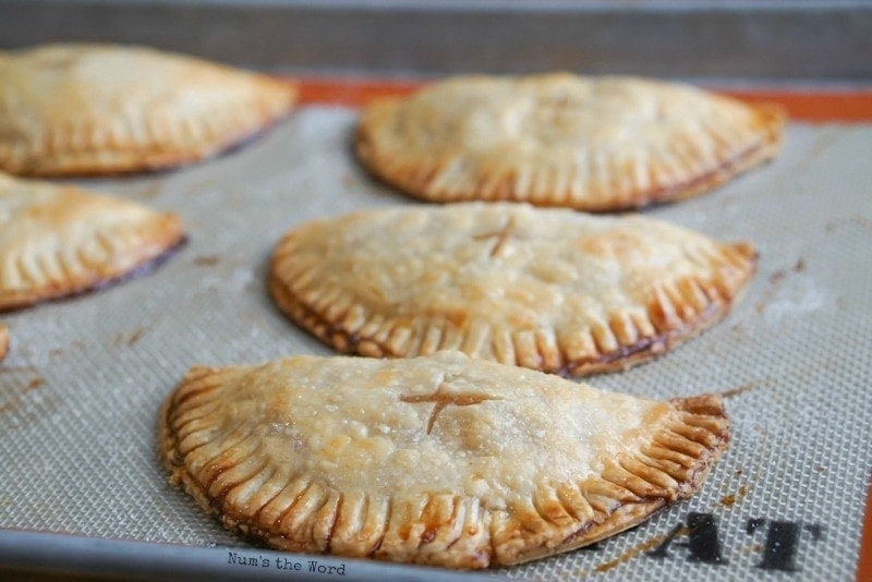 Pear Hand Pies - close up of hand pies on baking sheet