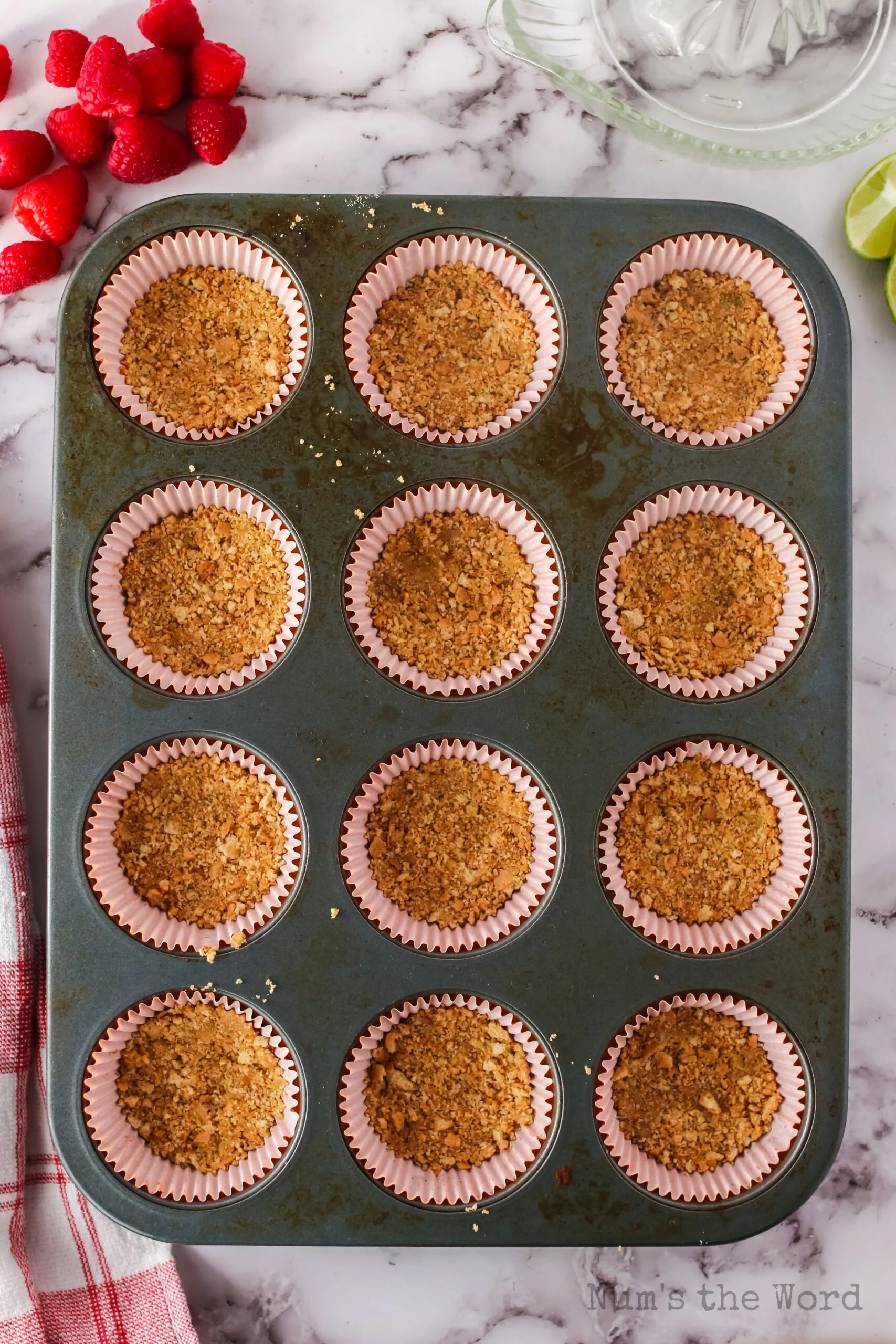 graham cracker crust pressed into 12 muffin tin cupcake liners