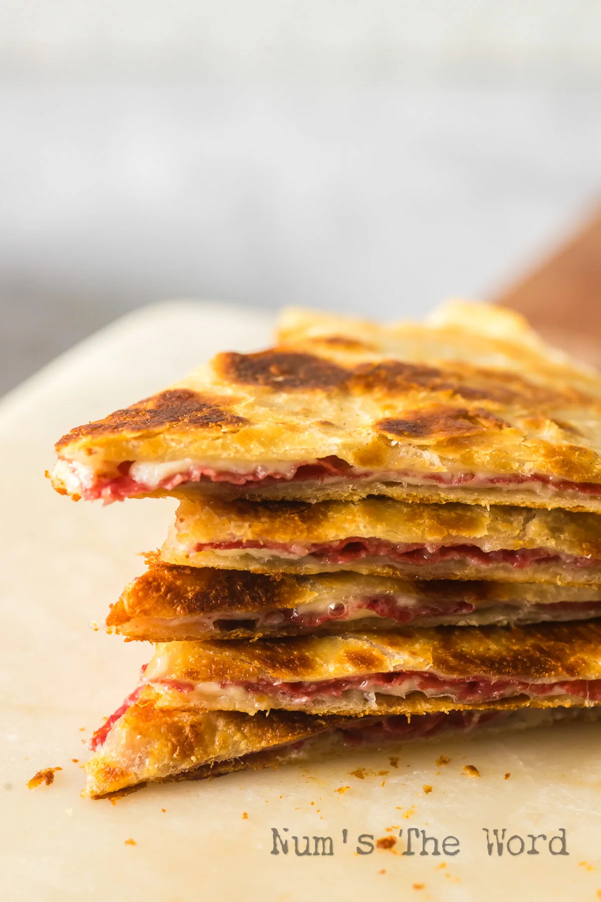 quesadilla triangles stacked on top of each other.