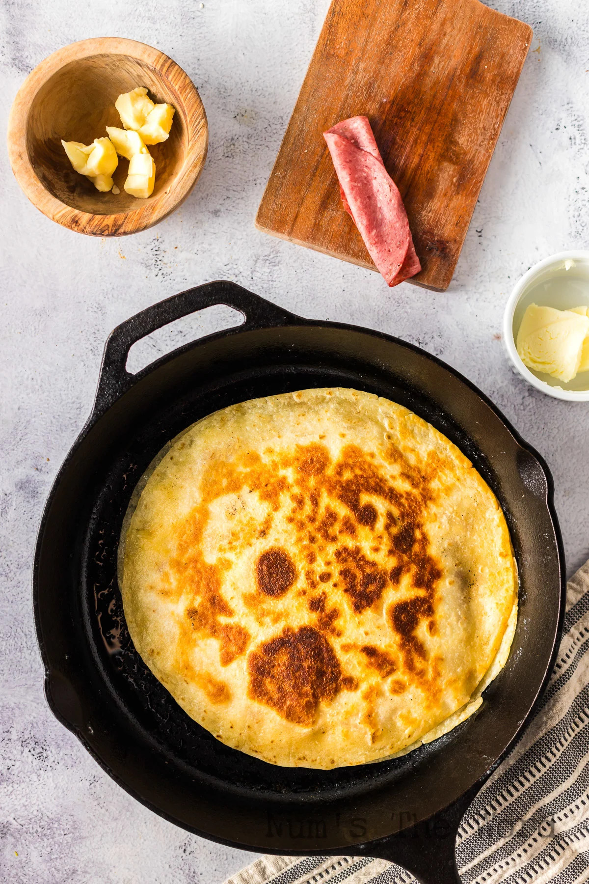 quesadilla cooked in a skillet.