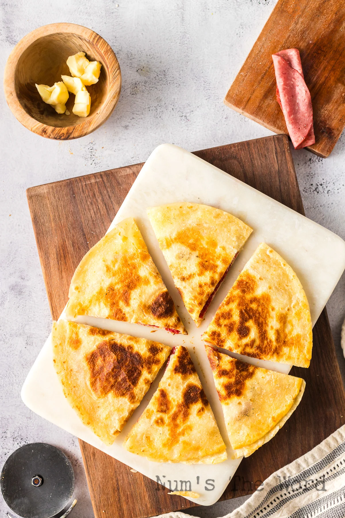 quesadilla on a plate cut into 6 slices