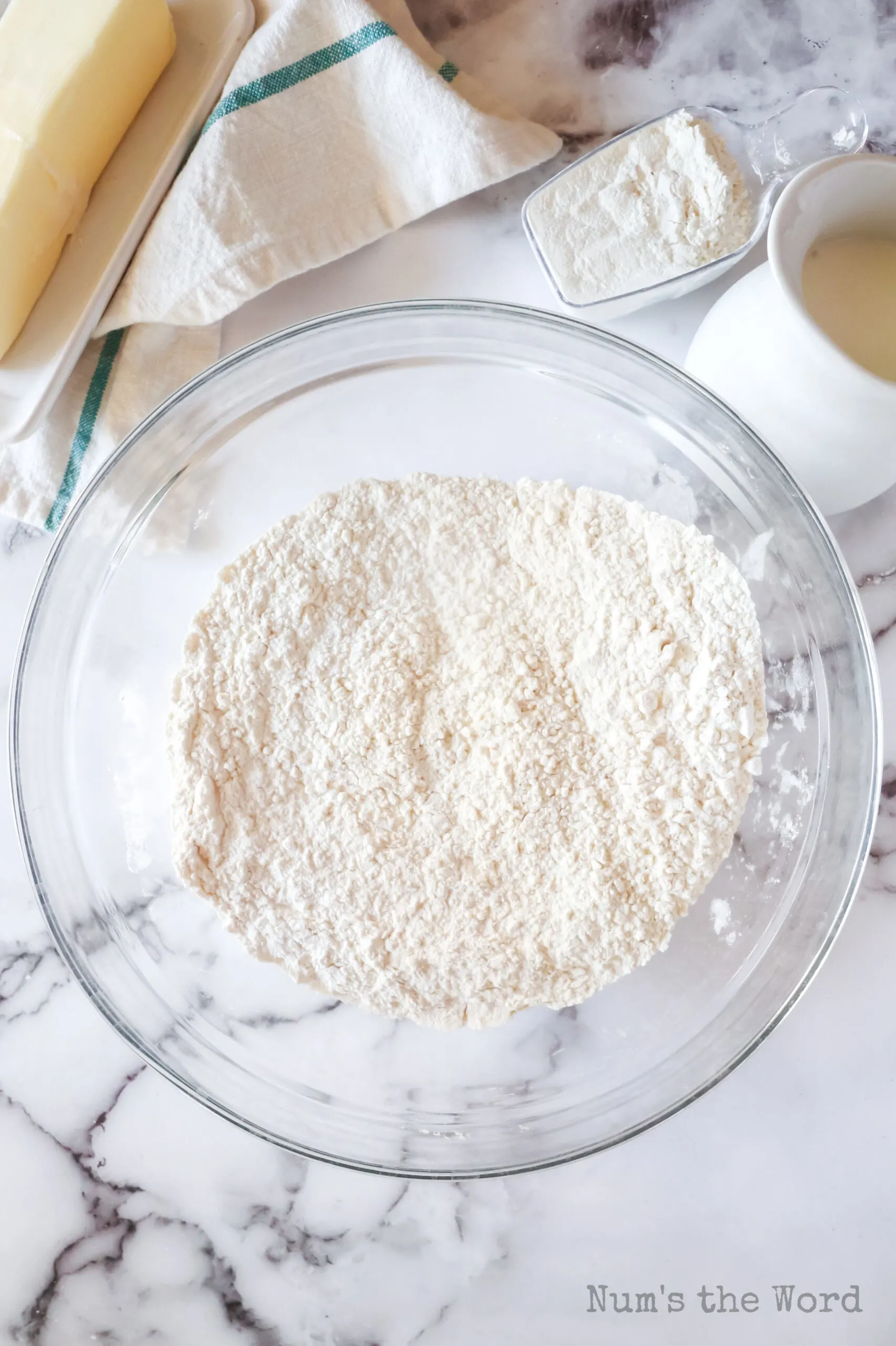 flour, baking soda and salt all mixed in a bowl