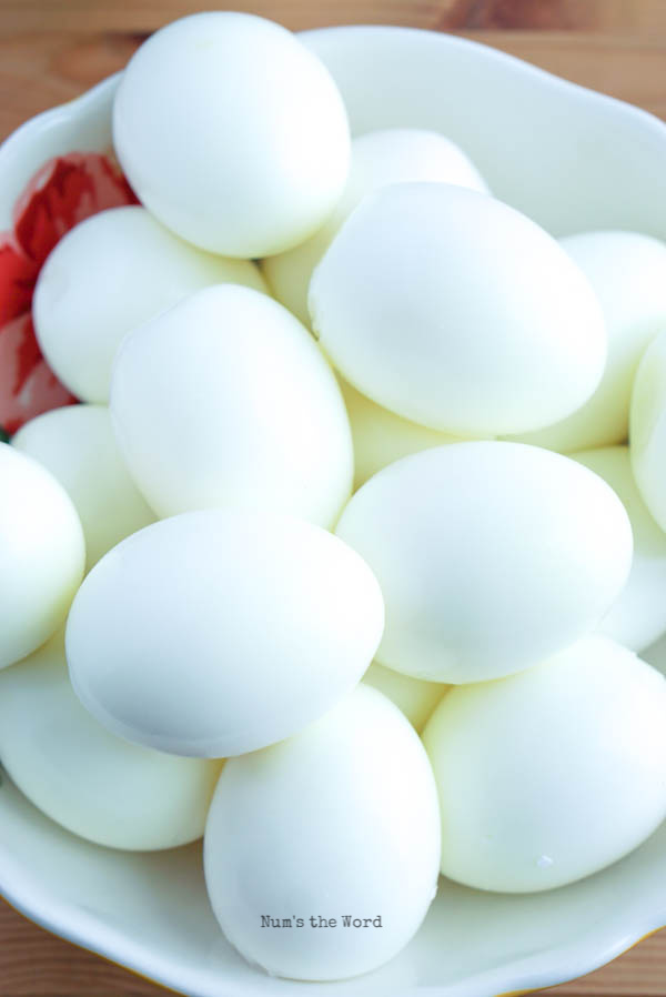 Bowl full of perfectly peeled eggs. 
