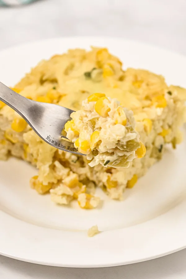 Mexican Sour Cream Rice - fork holding up a scoop of rice