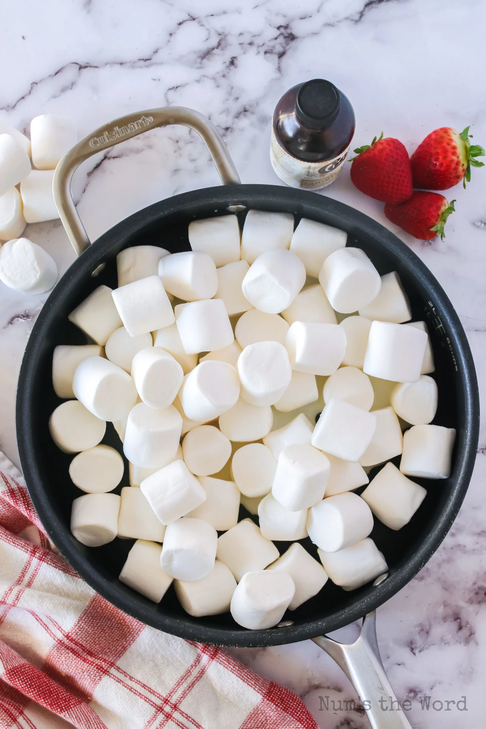 Marshmallows and milk added to pan