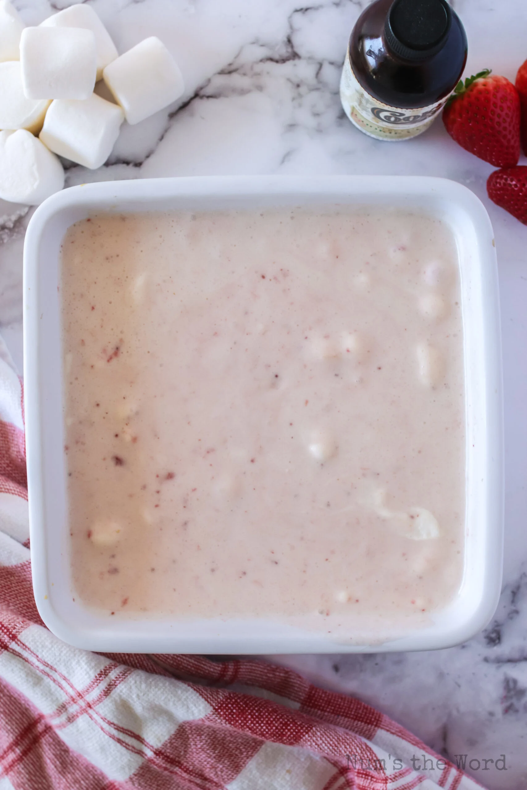 strawberry marshmallow bar mixture added on top of graham cracker crust