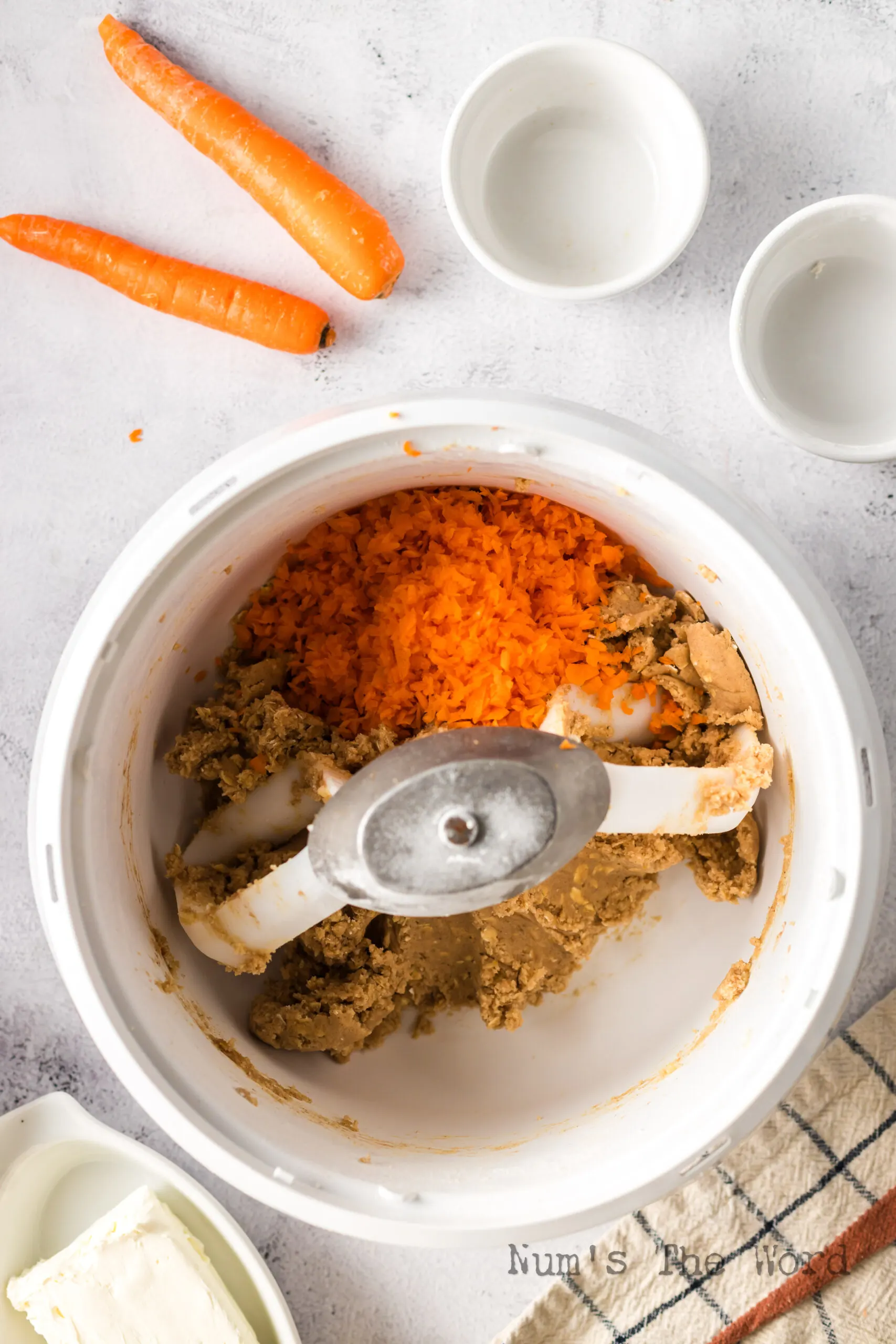shredded carrots added to cookie dough mix