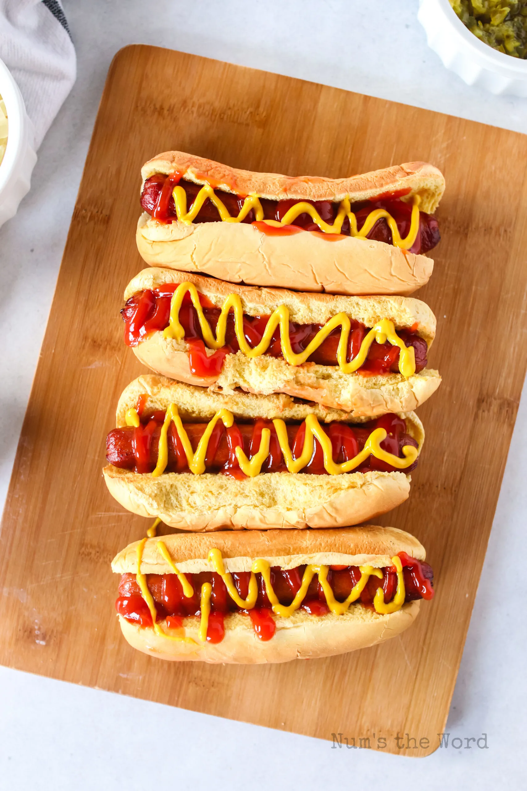 hot dogs with ketchup and mustard, top angle view