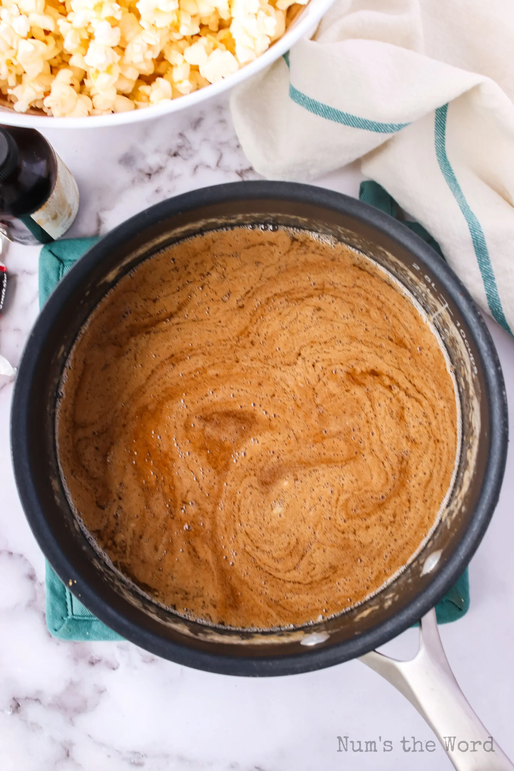 Tootsie roll caramel mixture in a pot, melted