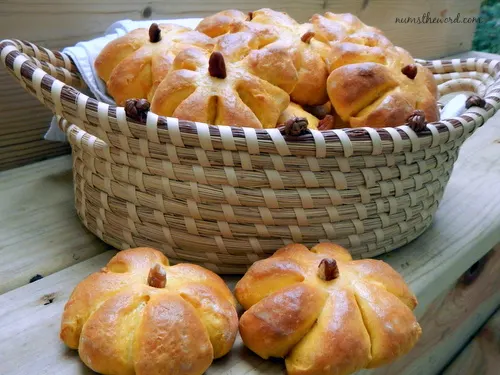 Pumpkin Bread Rolls - Baked rolls with stems in basket