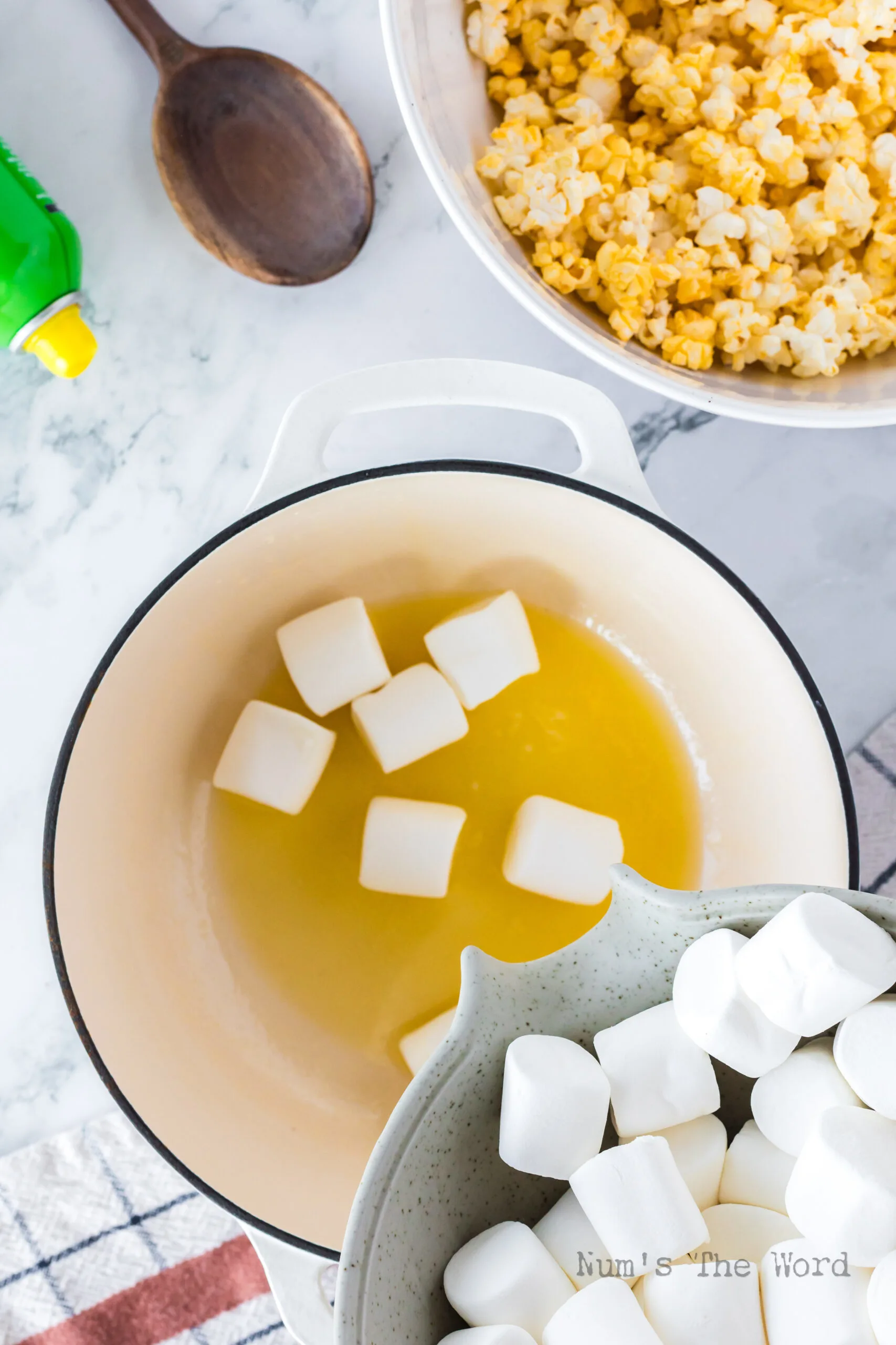 Melted Butter with marshmallows being added to pot