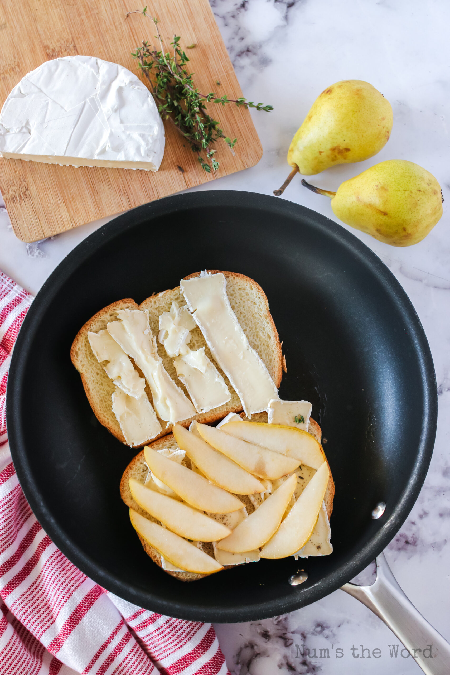 sliced pears placed on top of one slice of bread