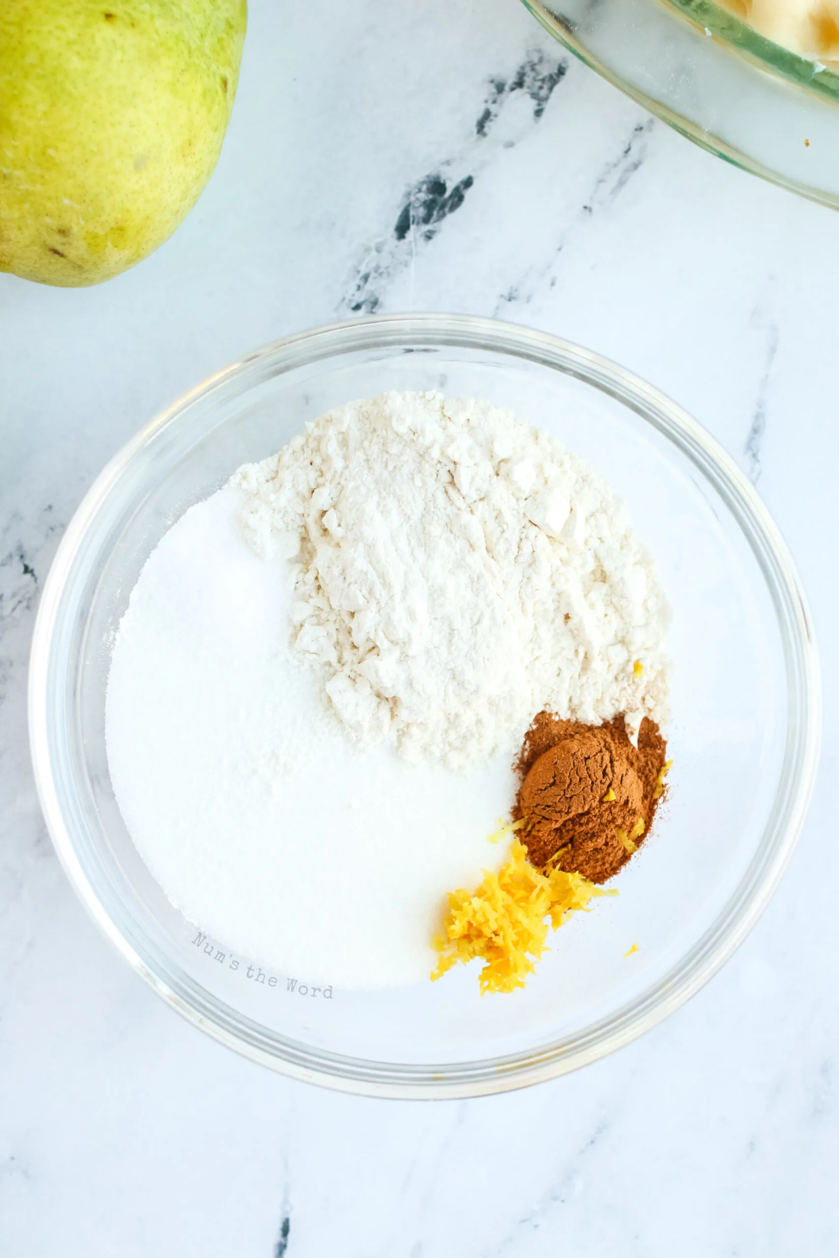 sugar, flour, salt, cinnamon and lime zest added to a bowl