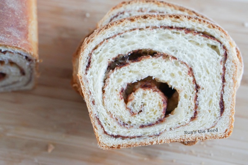 Cinnamon Roll Bread - sliced bread stacked on top of each other, photo taken from above