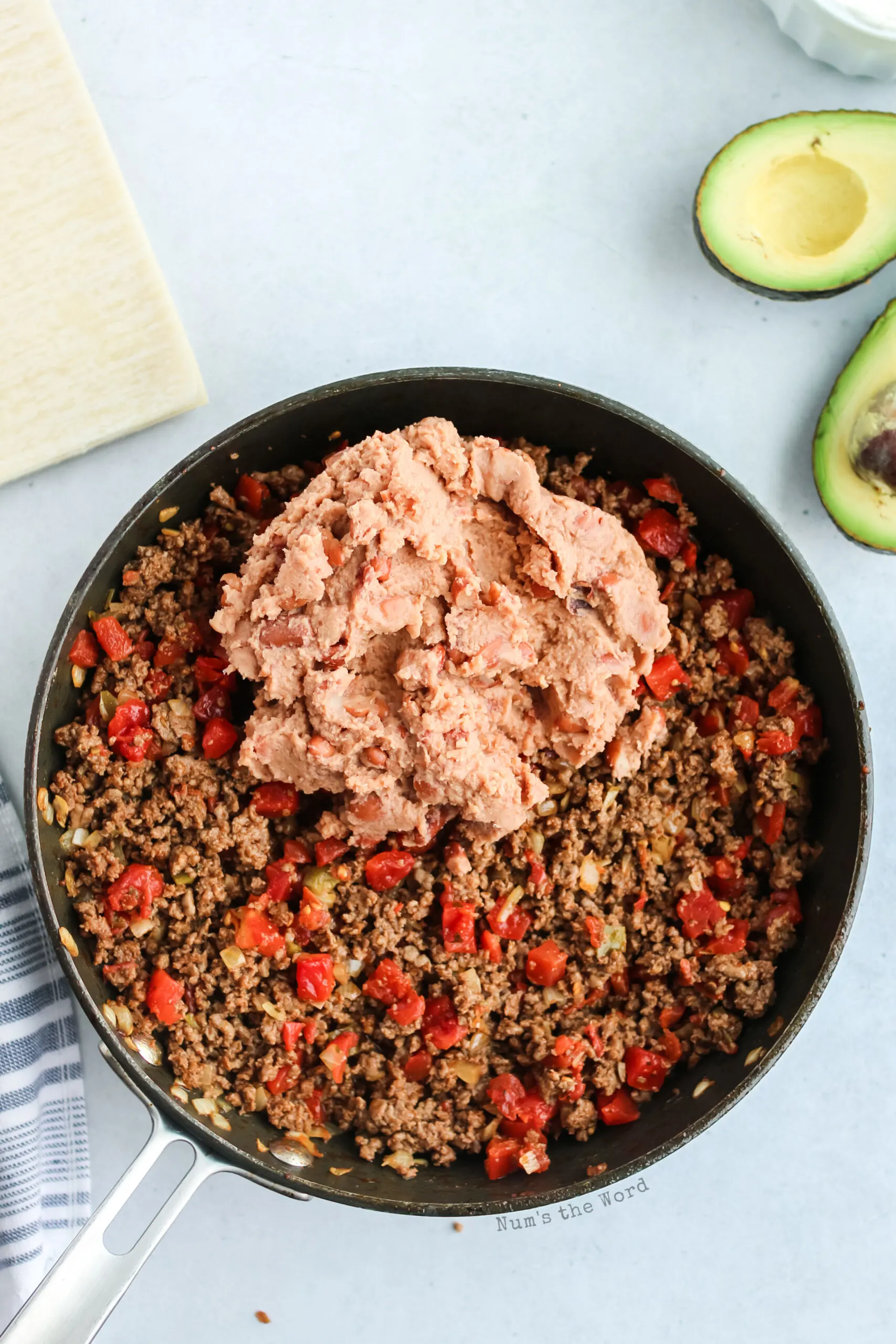 refried beans added to ground beef mixture