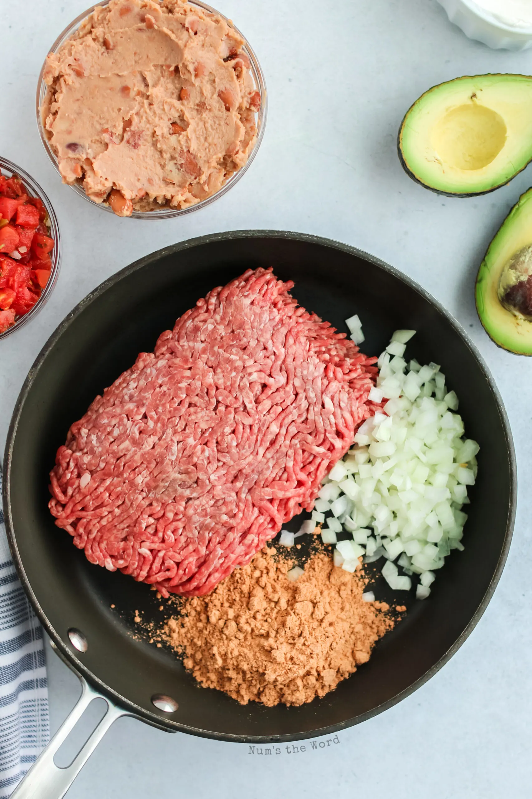 ground beef, onions and taco seasoning in a skillet