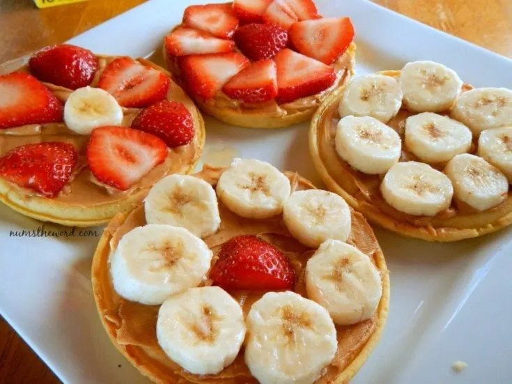 Eggo Waffle Fruit Pizza - waffles topped with fresh fruit - bananas and strawberries