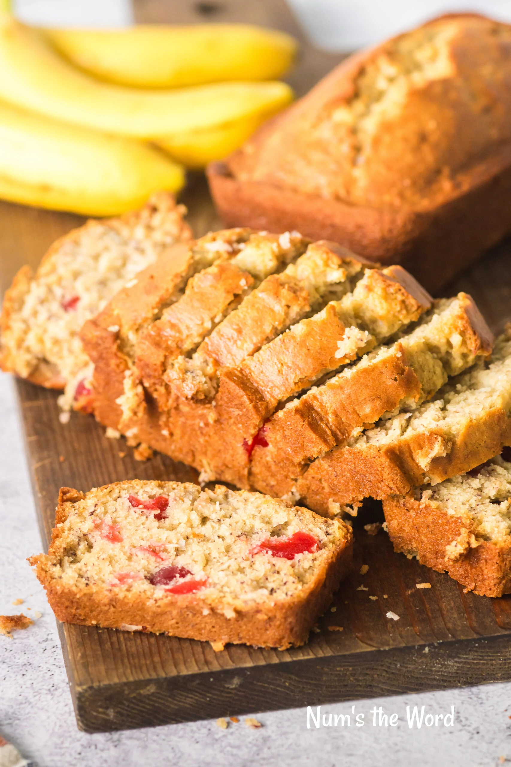 side view of loaf of bread sliced with a single piece on the side to show yummy insides.