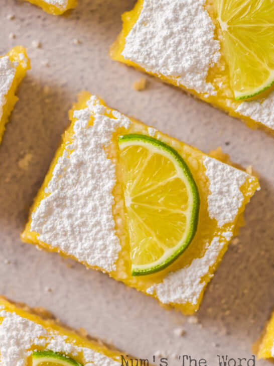 zoomed in image of lime curd bars cut and ready to serve.