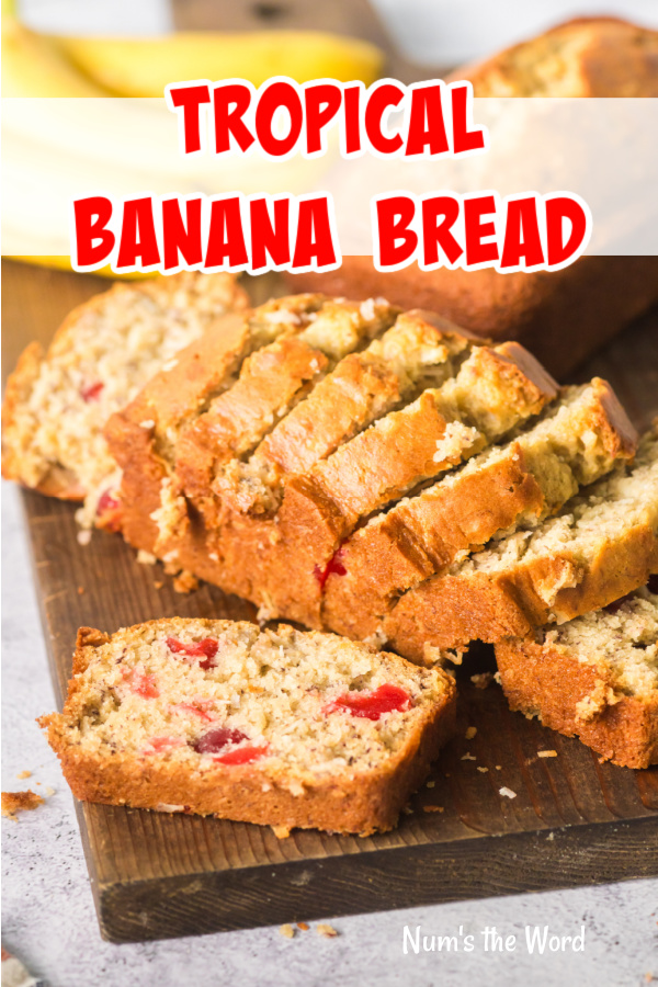 Main image for Tropical Banana Bread recipe. Sliced bread on a cutting board.
