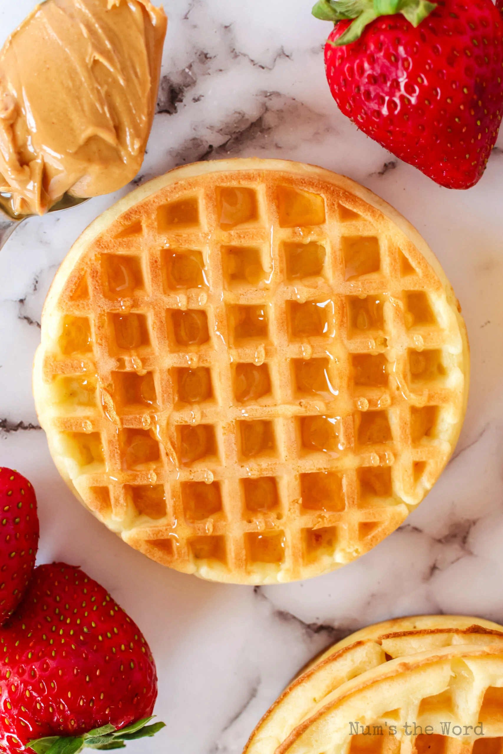 Honey spread on toasted eggo