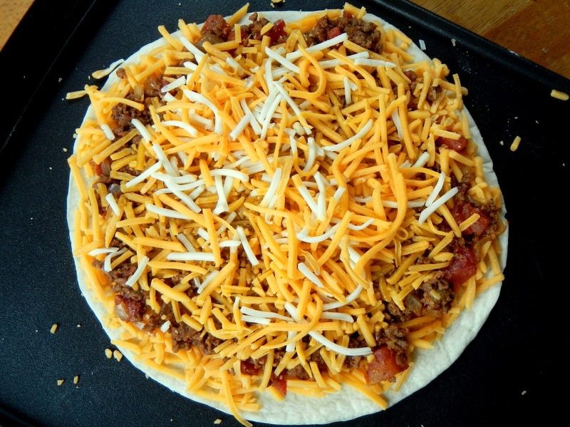 Mexican Quesadilla - flat tortilla layered with cheese, ground beef mixture and more cheese