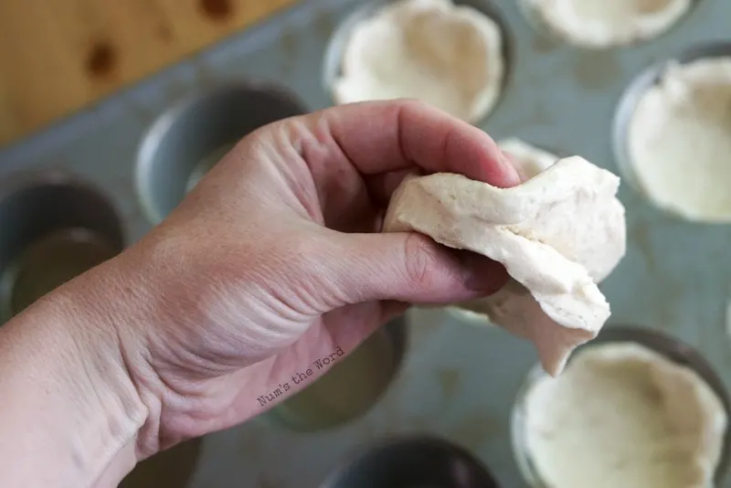 Barbecue Beef Cups - Step 1 - separating biscuits in half.