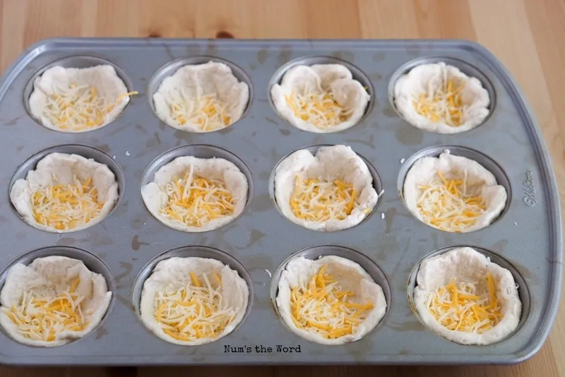Barbecue Beef Cups - step 3 cheese on top of dough
