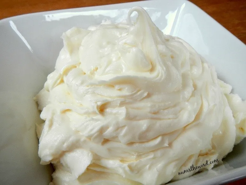 Cream Cheese Frosting - Large pile of cream cheese frosting in a bowl.
