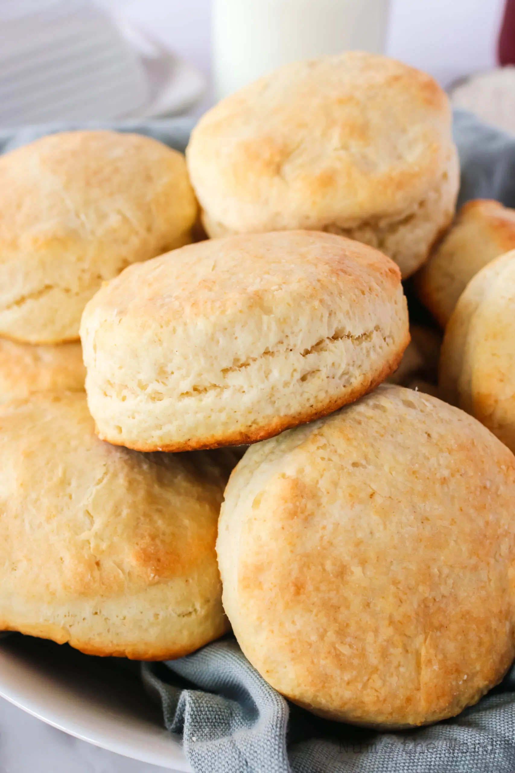 plate piled high with buttermilk biscuits
