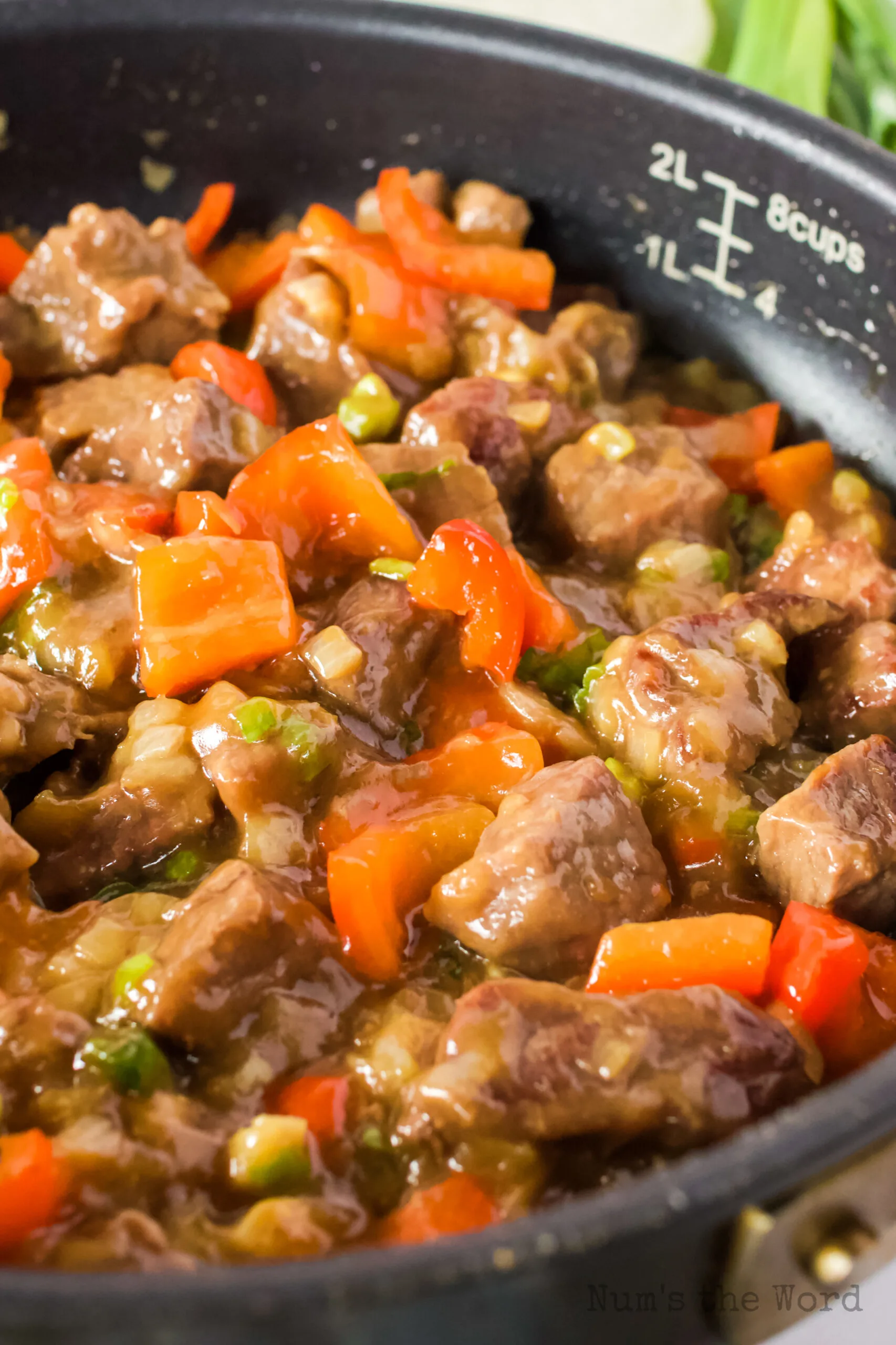easy pepper steak in pan and ready to serve over rice