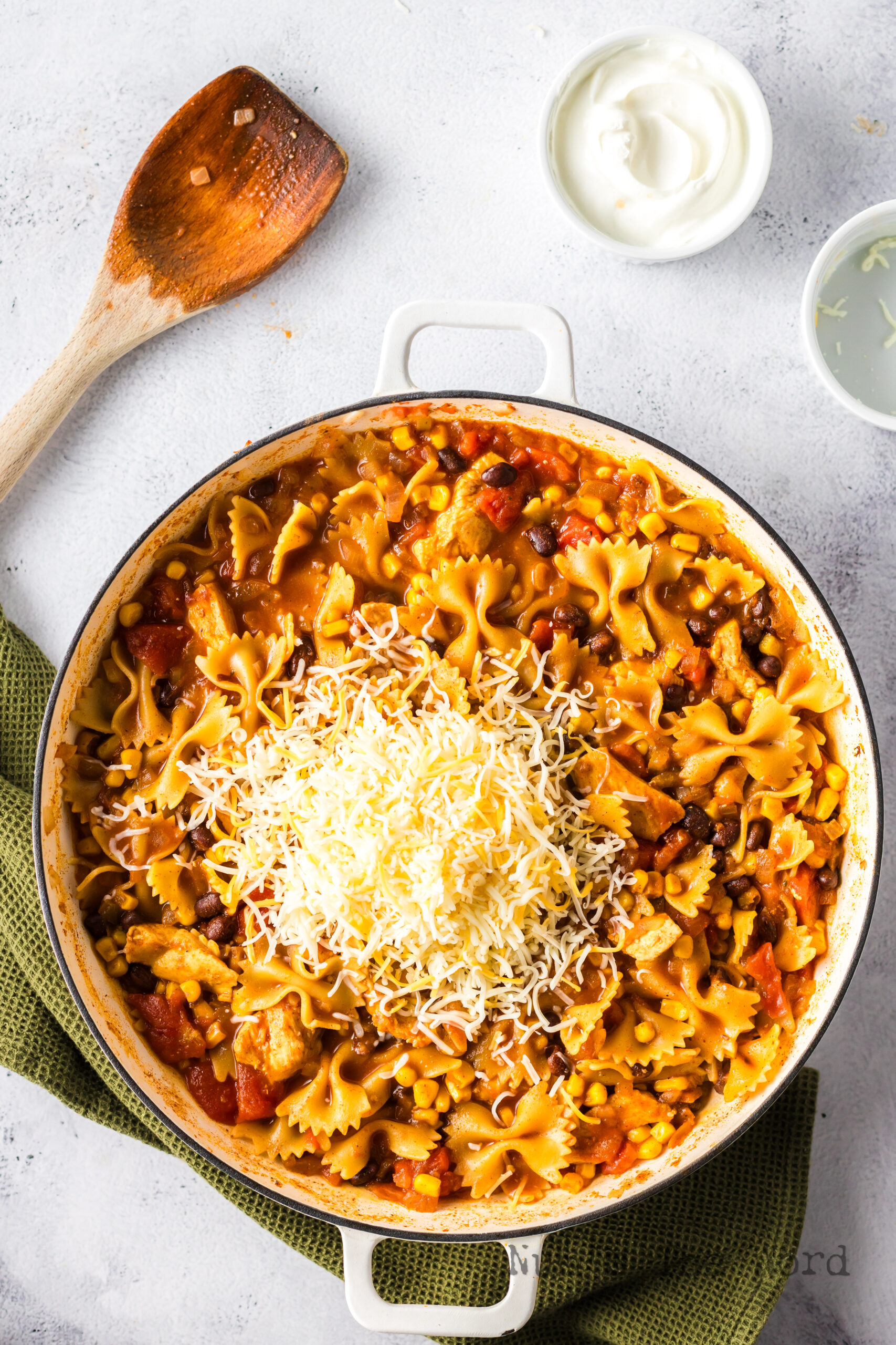 Cheese added to mexican pasta mixture.