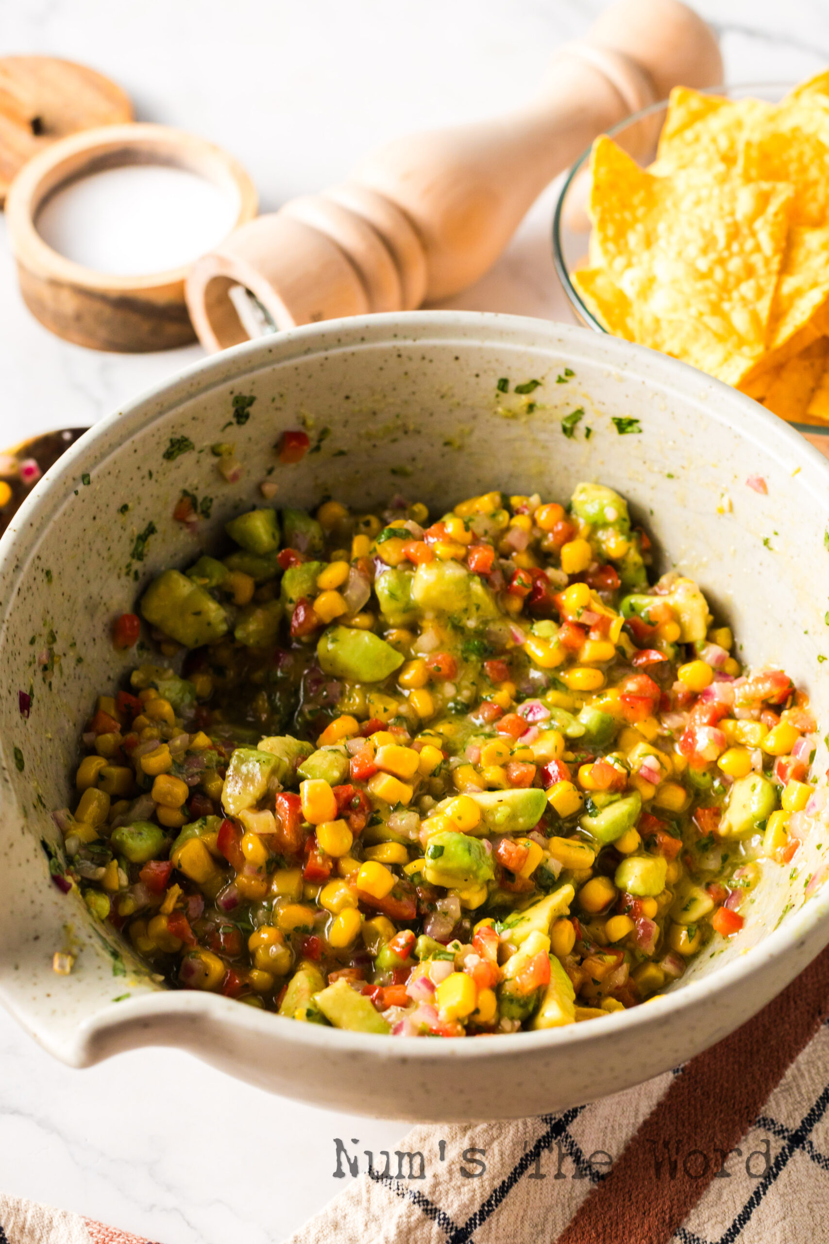 Corn and Avocado Salsa in mixing bowl