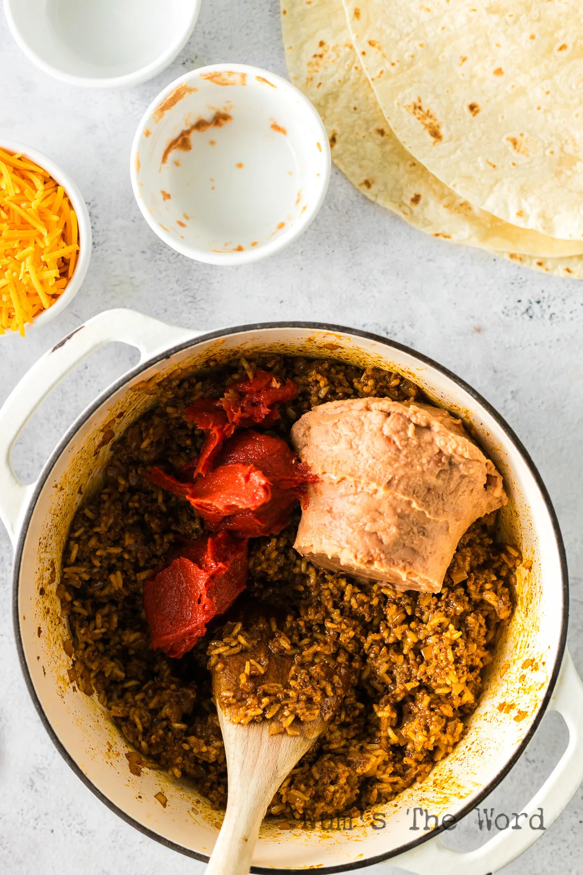 refried beans and tomato paste added to bean mixture.