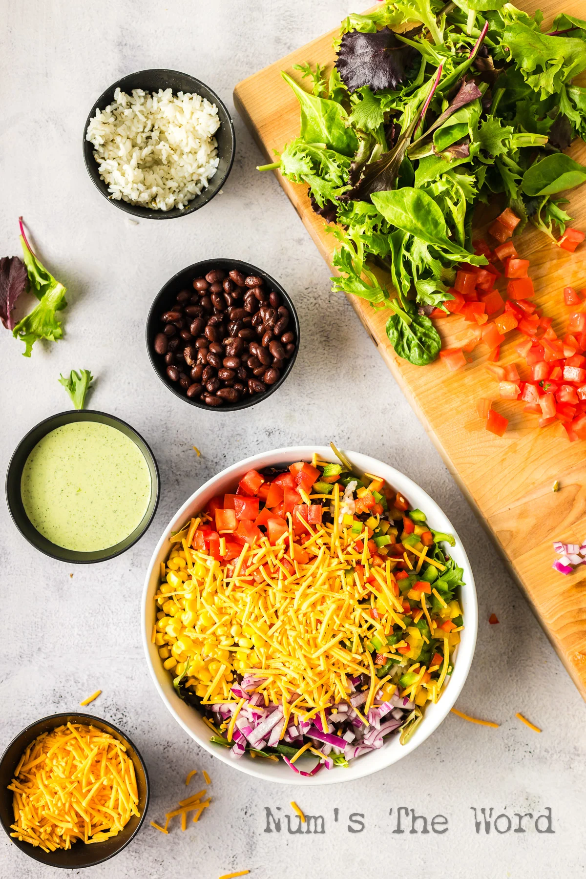 Cheese added on top of rice bowl.