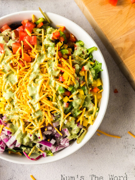 zoomed in image of prepared salad in bowl.