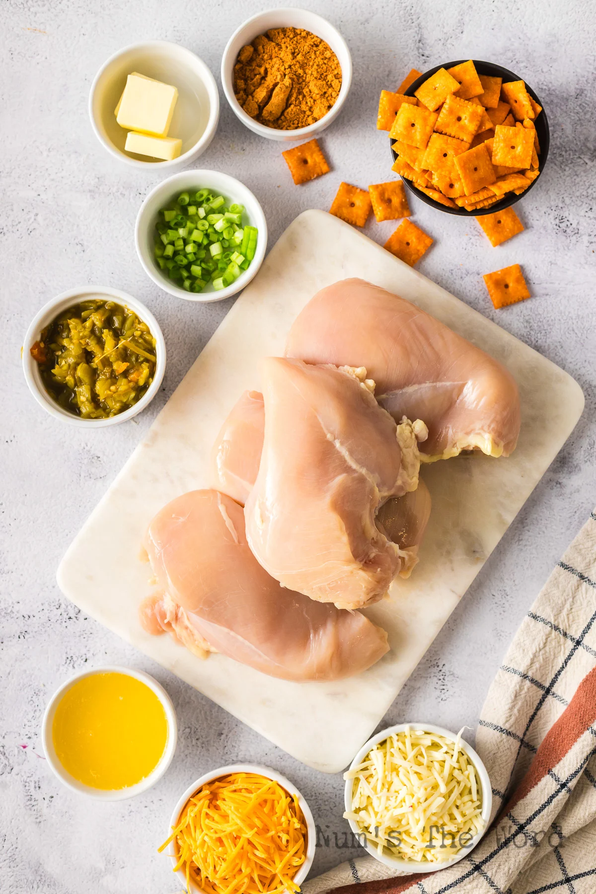 All ingredients for mexican stuffed chicken laid out on ounter