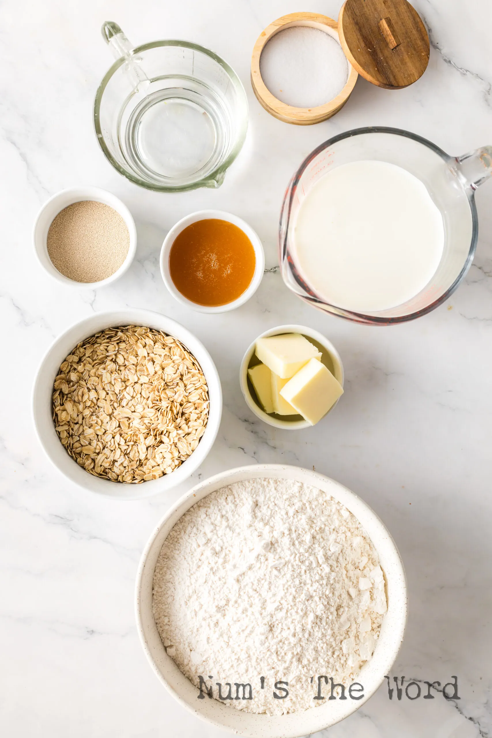 All ingredients for Oatmeal bread on counter.