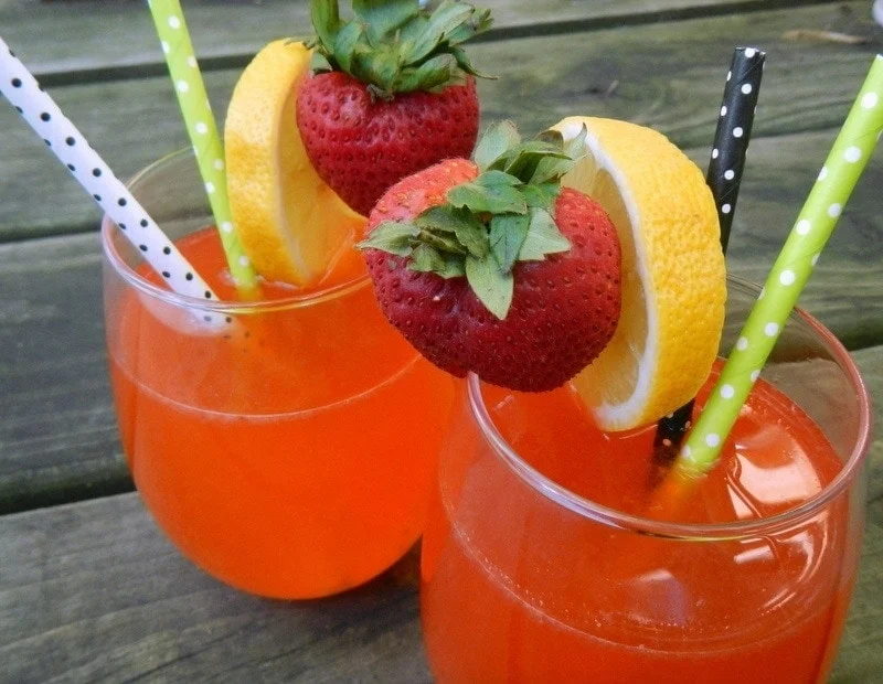 Natural Strawberry Lemonade - image of two glasses of lemonade ready to be sipped.