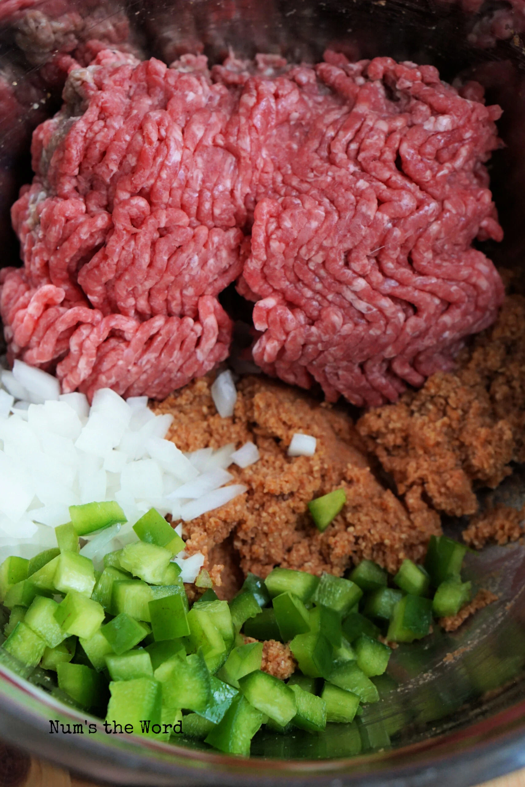 Beef crust ingredients placed in a bowl, umixed.