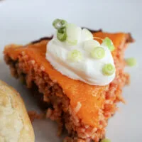 Triangle of country pie on a plate.