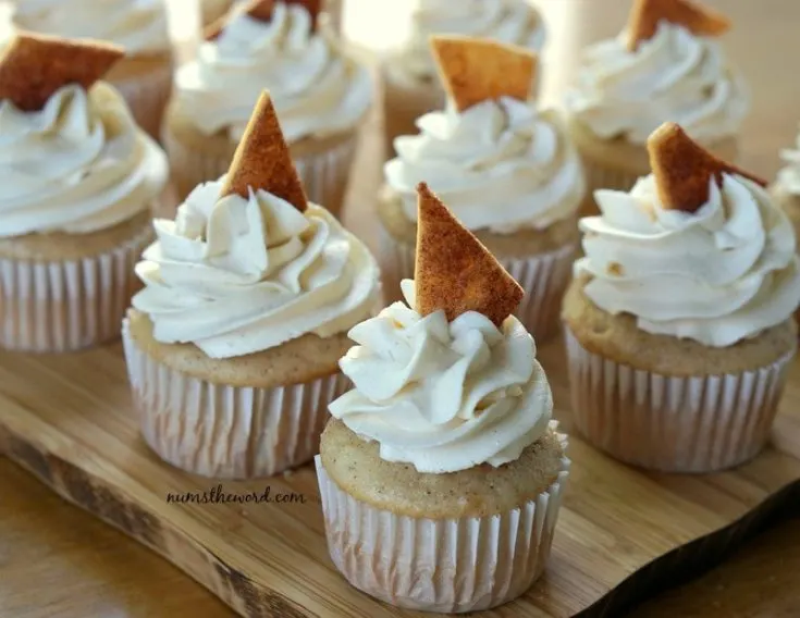 Apple Pie Cupcakes - Cupcakes filled, frosted and with pie crust sticking out of frosting