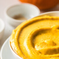 zoomed in image of pumpkin dip in bowl ready to serve.