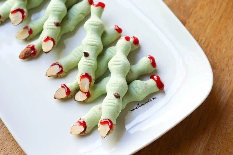Creepy Witches Fingers - fingers on platter with chocolate warts applied.