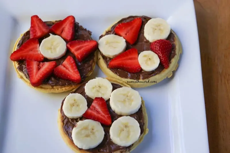 Eggo & Nutella Breakfast Pizzas - strawberries & blueberries topped nutella