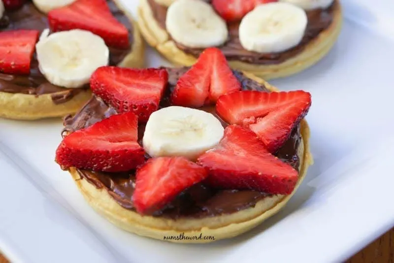 Eggo & Nutella Breakfast Pizzas - close up shot of waffles with nutella and fruit