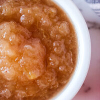 zoomed in image of applesauce in bowl ready to eat