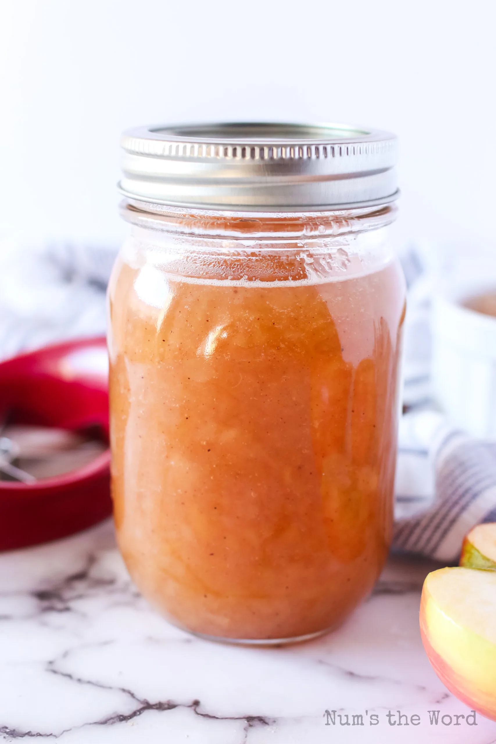 jar of applesauce ready to store in the frige